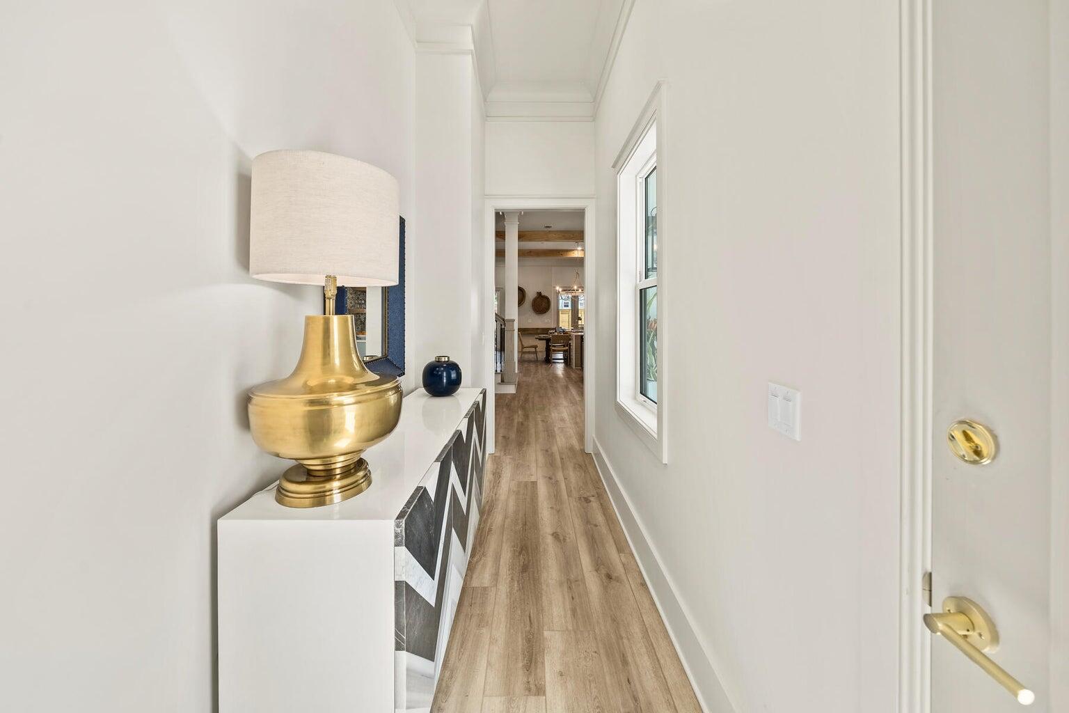 21524 Front Beach Road Panama City Beach, FL 32413 - Photo 59 of 73 a view of hallway with wooden floor