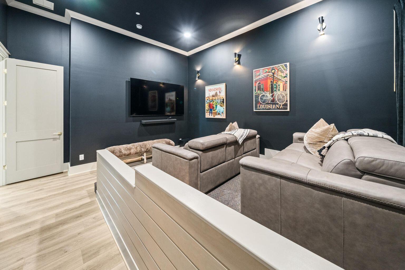 21524 Front Beach Road Panama City Beach, FL 32413 - Photo 60 of 73 a living room with furniture and a flat screen tv