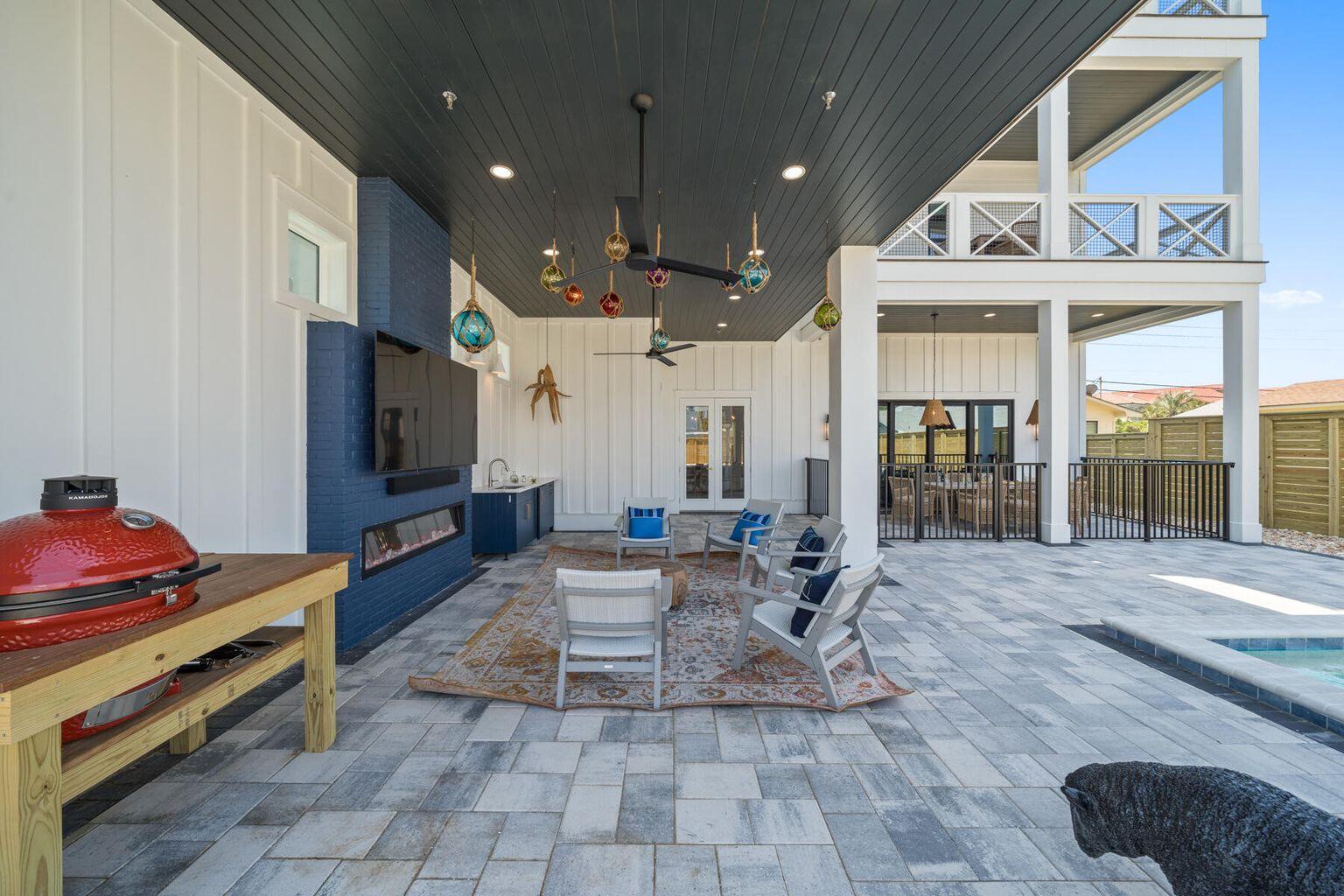 21524 Front Beach Road Panama City Beach, FL 32413 - Photo 66 of 73 a lobby with furniture and a flat screen tv