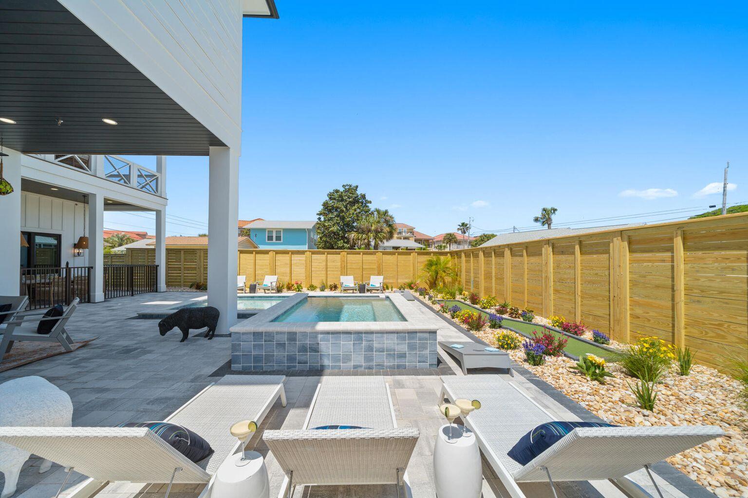 21524 Front Beach Road Panama City Beach, FL 32413 - Photo 71 of 73 a view of swimming pool with outdoor seating and a patio