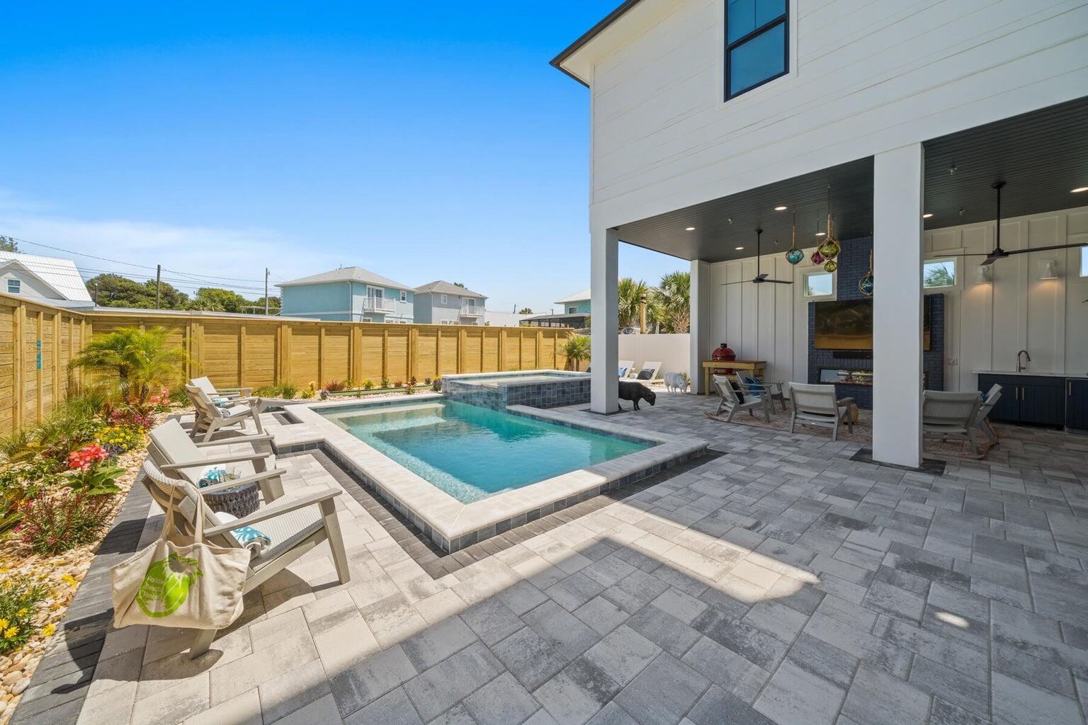 21524 Front Beach Road Panama City Beach, FL 32413 - Photo 73 of 73 a living room with couches a flat screen tv and outdoor view