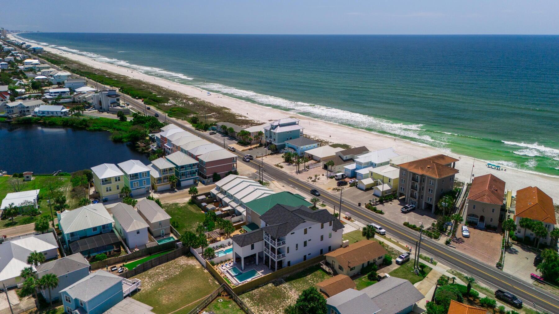 21524 Front Beach Road Panama City Beach, FL 32413 - Photo 9 of 73 an aerial view of ocean and residential houses with outdoor space