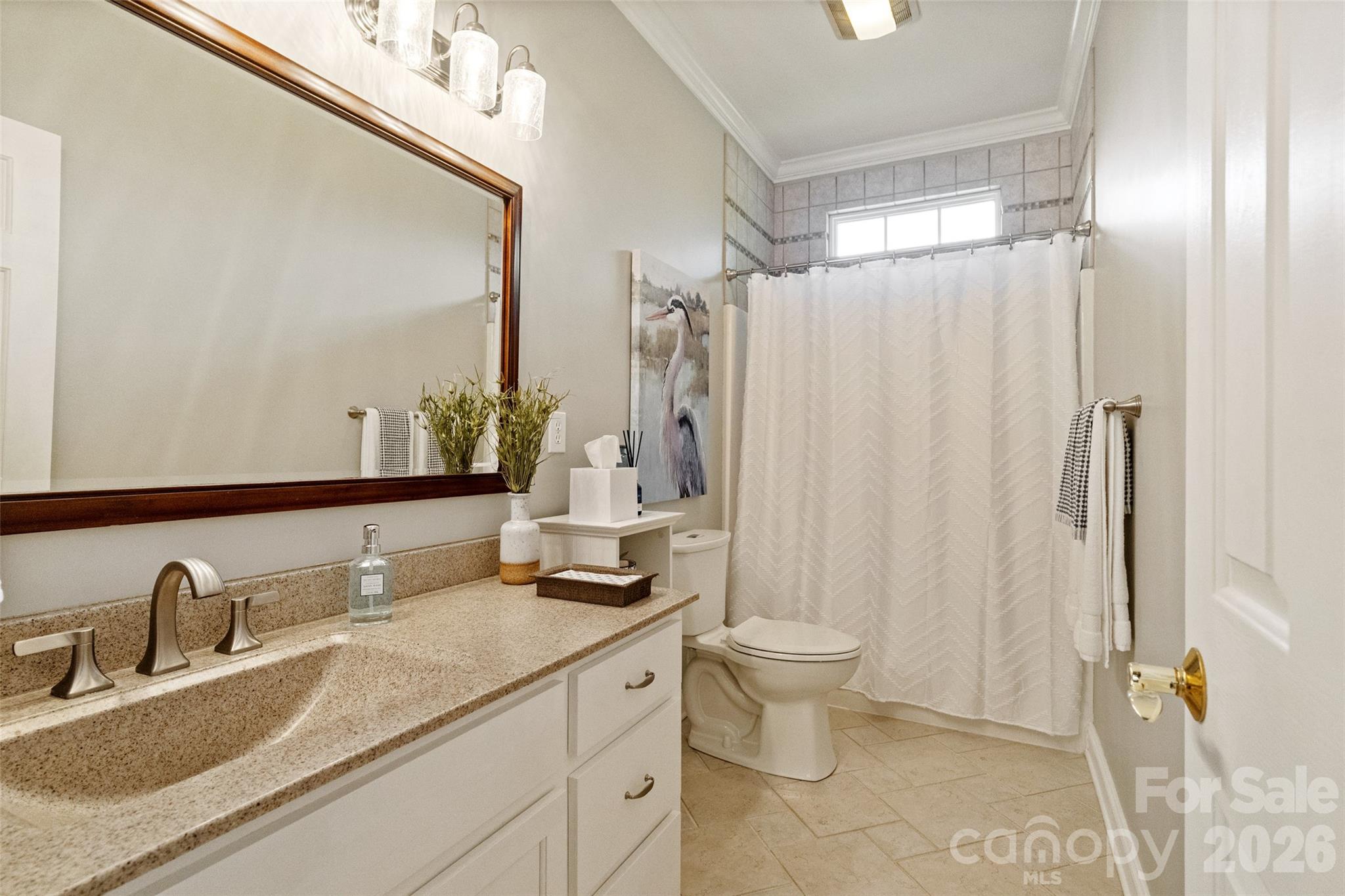 1701 South Point Road Belmont, NC 28012 - Photo 18 of 44 a bathroom with a double vanity sink toilet and shower