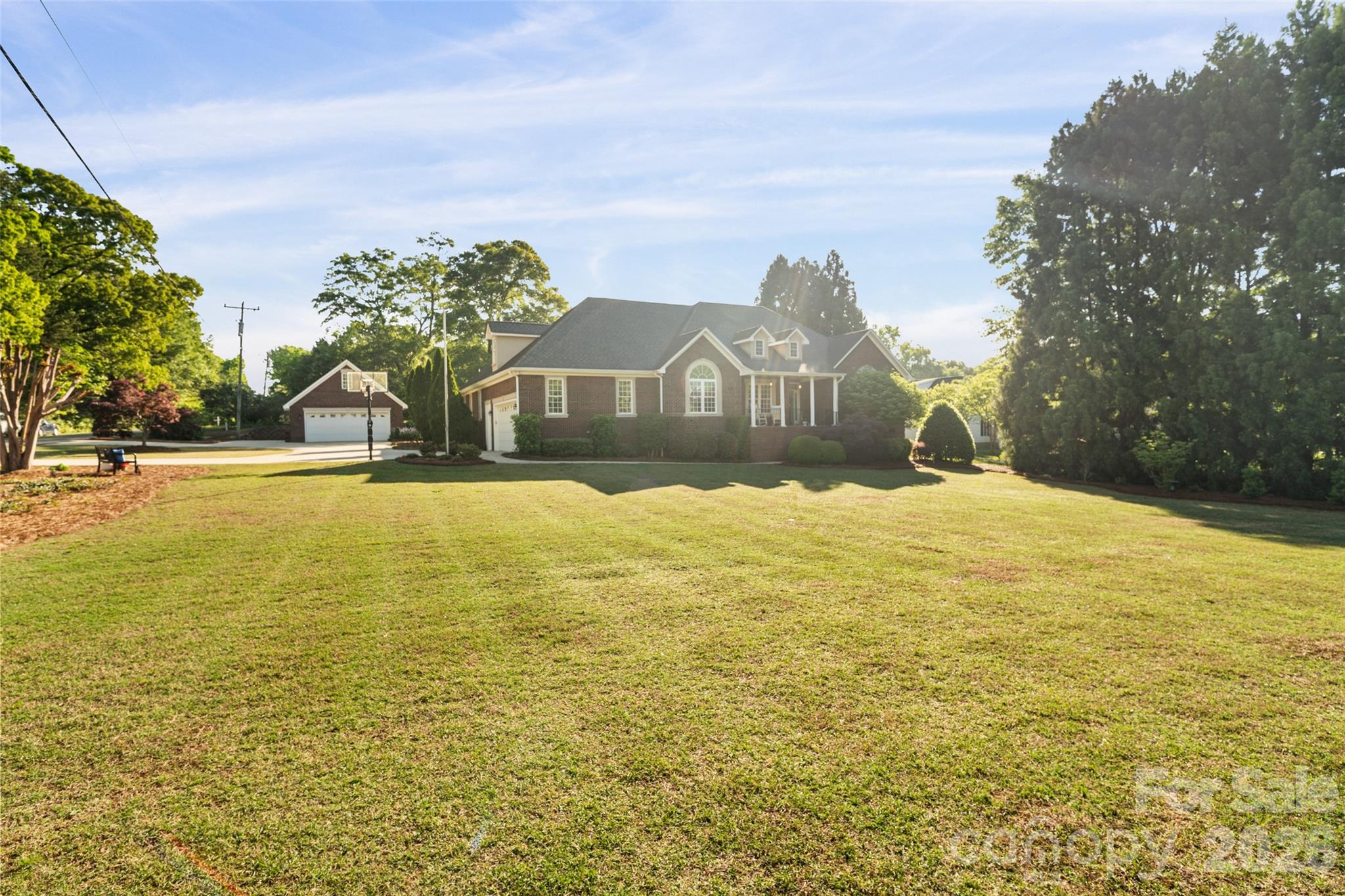 1701 South Point Road Belmont, NC 28012 - Photo 2 of 44 a view of a large pool with an ocean view