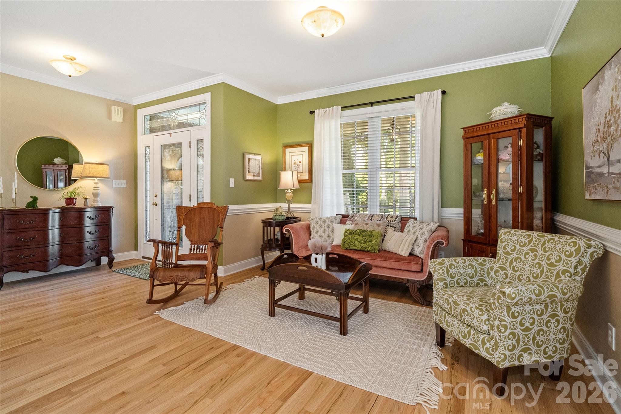 1701 South Point Road Belmont, NC 28012 - Photo 23 of 44 a living room with furniture and a large window