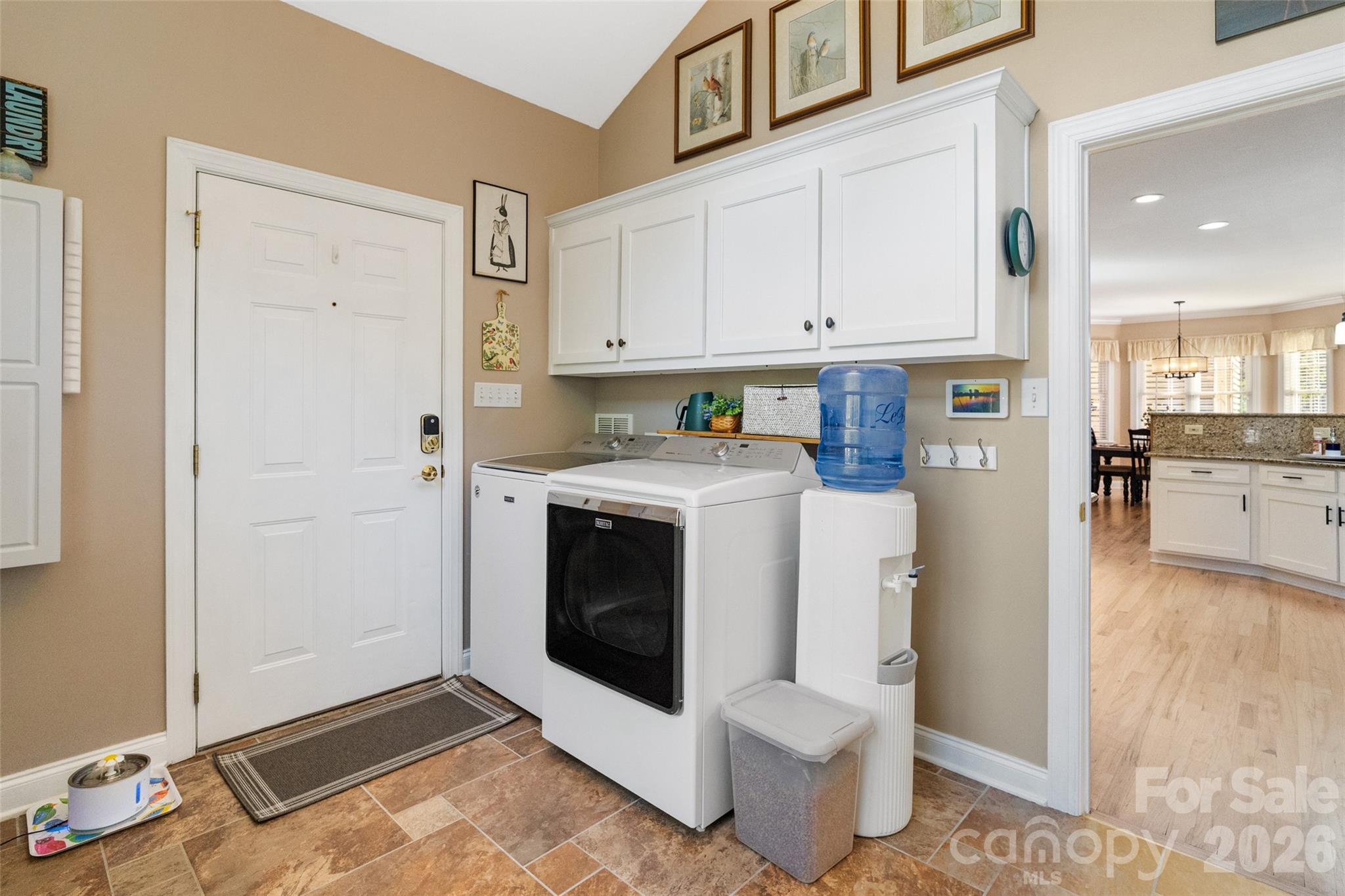 1701 South Point Road Belmont, NC 28012 - Photo 25 of 44 a utility room with cabinets washer and dryer