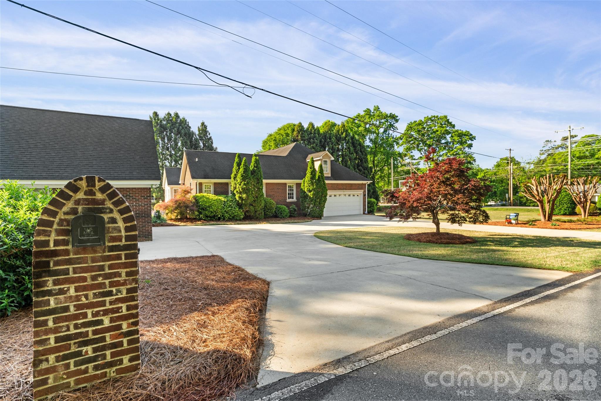 1701 South Point Road Belmont, NC 28012 - Photo 30 of 44 a view of a building with tree s