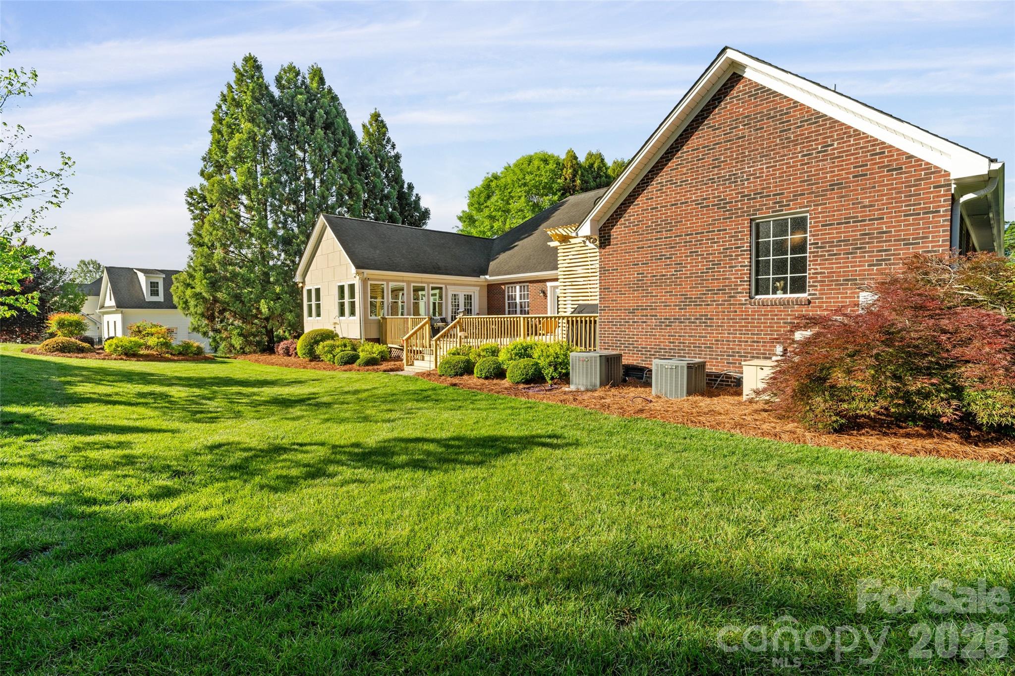 1701 South Point Road Belmont, NC 28012 - Photo 32 of 44 a view of a house with a yard