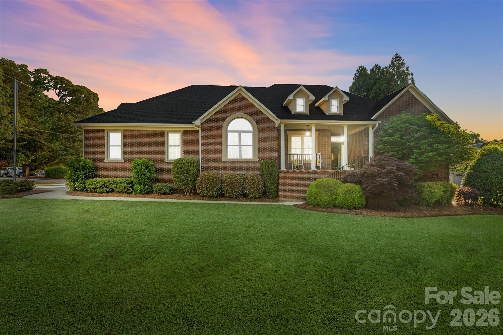 1701 South Point Road Belmont, NC 28012 - Photo 44 of 44 a front view of a house with a garden