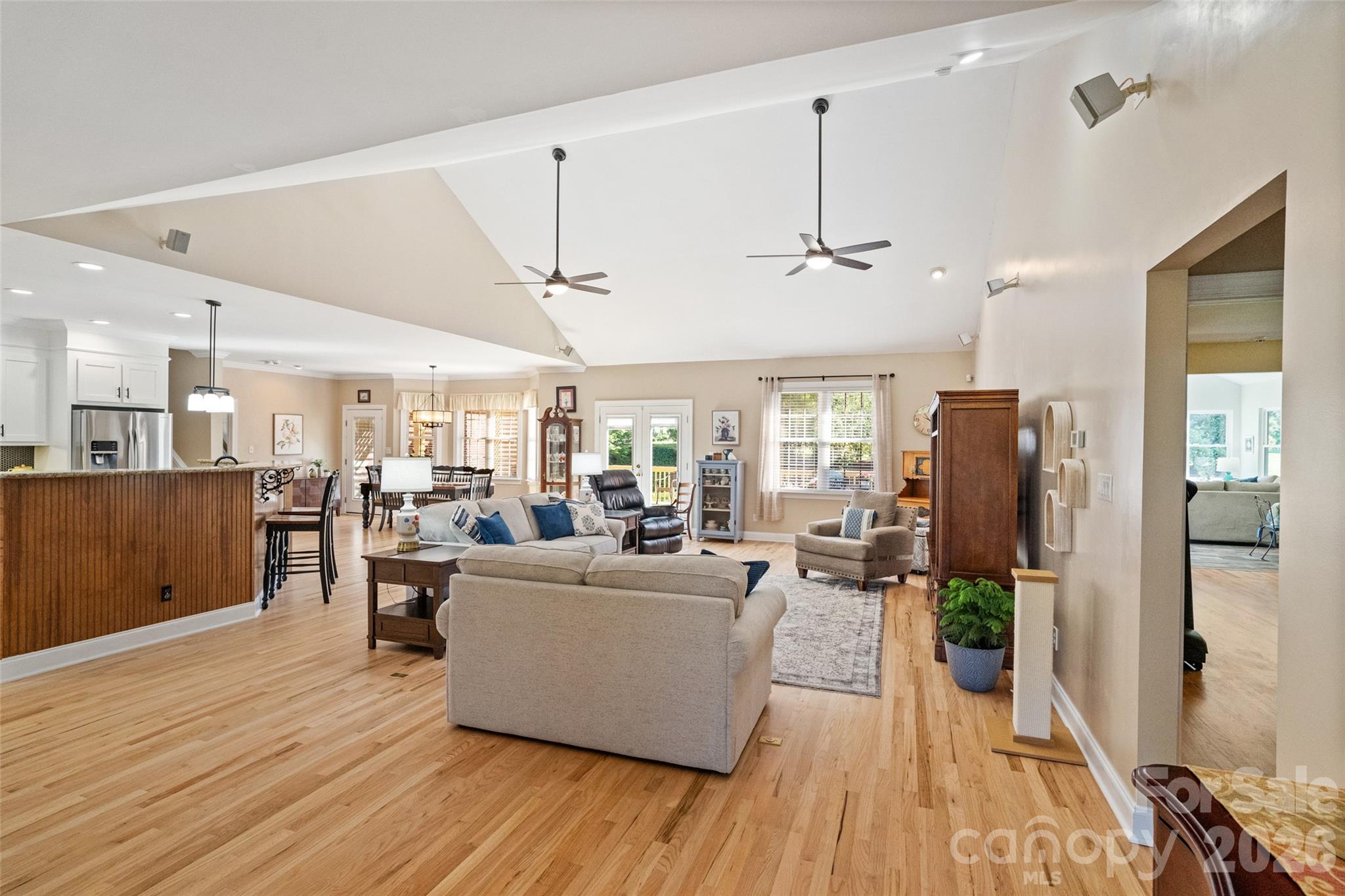 1701 South Point Road Belmont, NC 28012 - Photo 7 of 44 a living room with furniture or kitchen and a wooden floor
