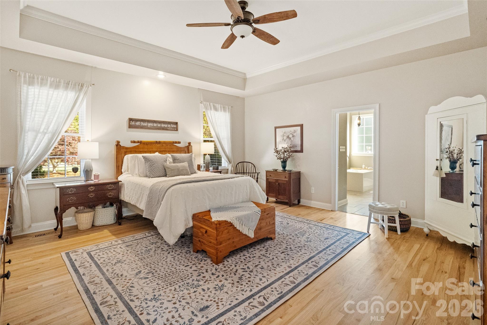 1701 South Point Road Belmont, NC 28012 - Photo 9 of 44 a bedroom with a bed a table and chair