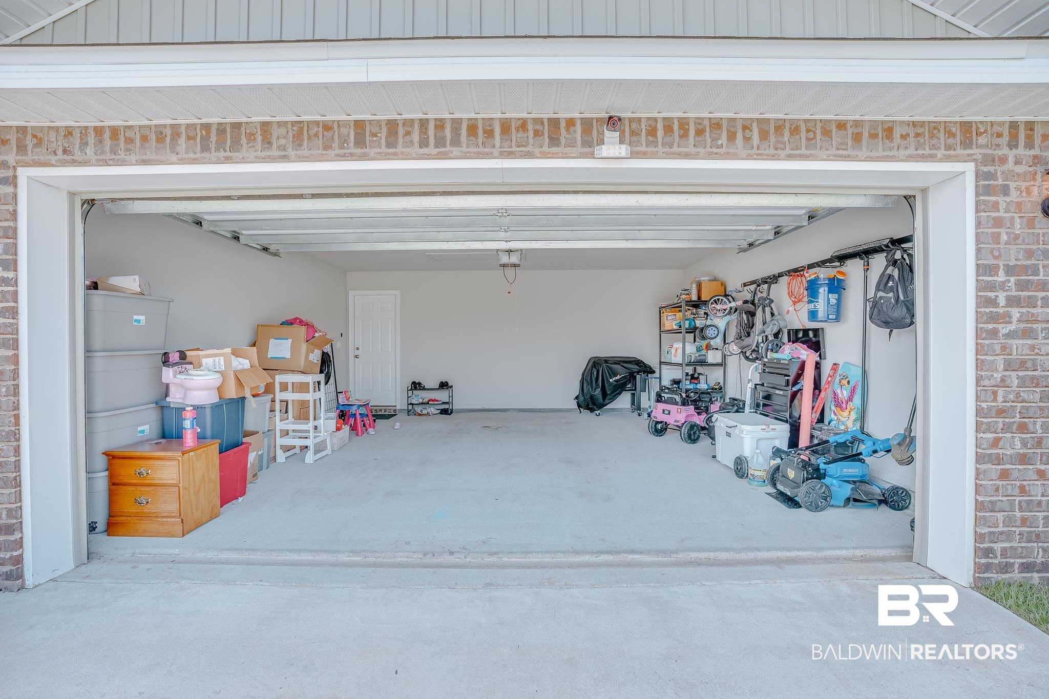 8242 Sycamore Way Semmes, AL 36575 - Photo 36 of 43 View of garage