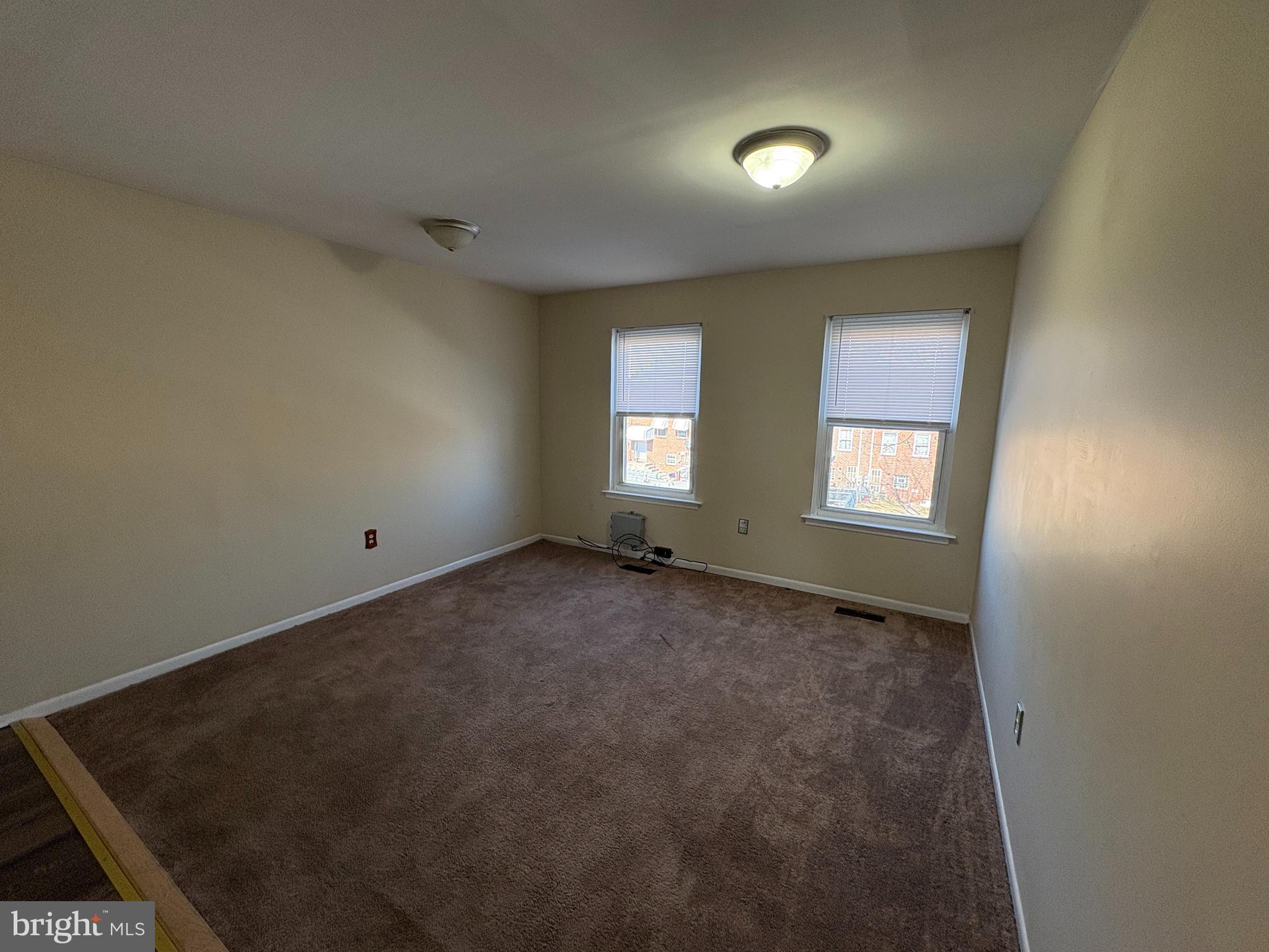 2840 Brighton Place, Unit 2 Philadelphia, PA 19149 - Photo 11 of 13 an empty room with windows and closet