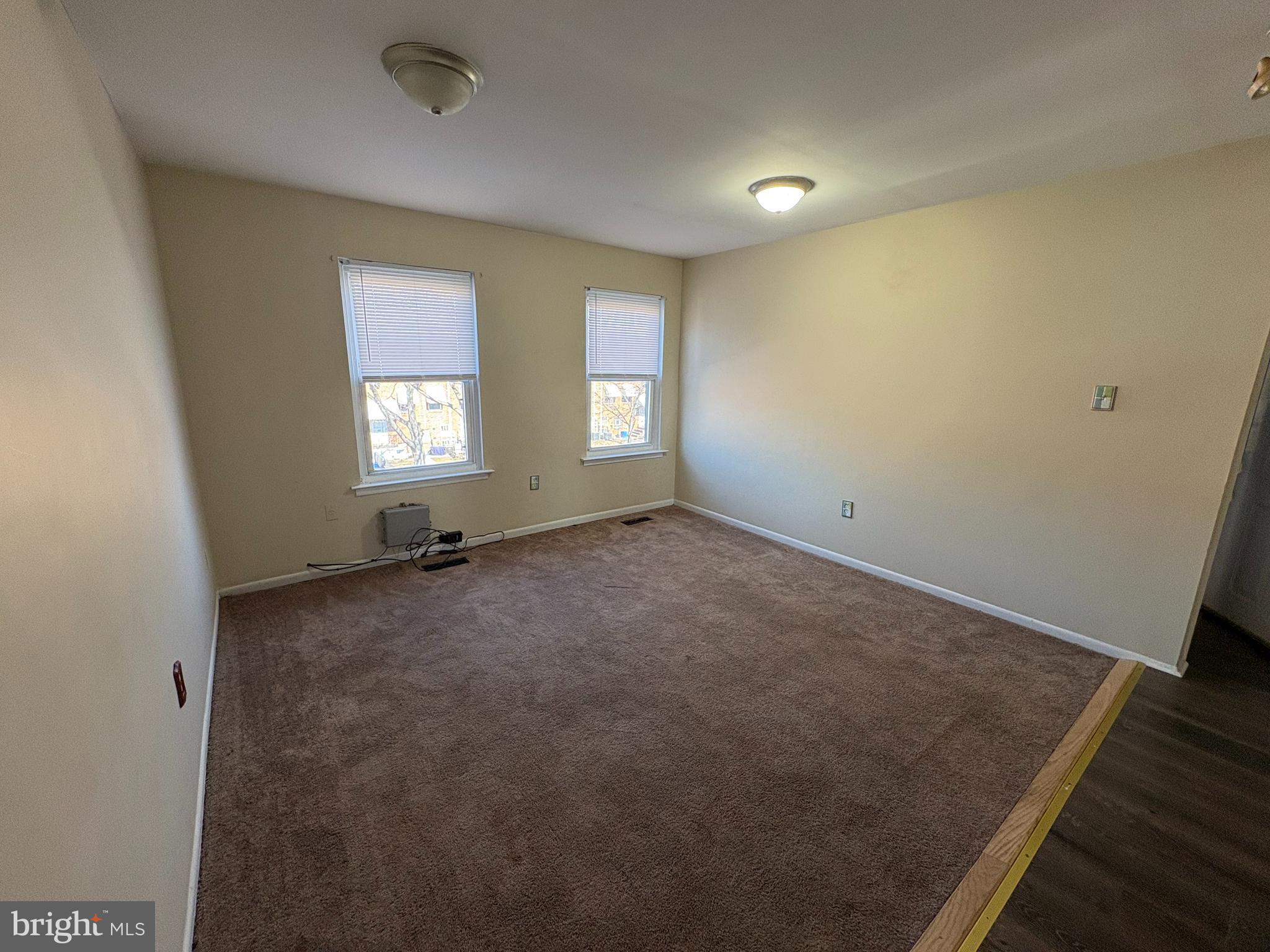 2840 Brighton Place, Unit 2 Philadelphia, PA 19149 - Photo 12 of 13 an empty room with windows