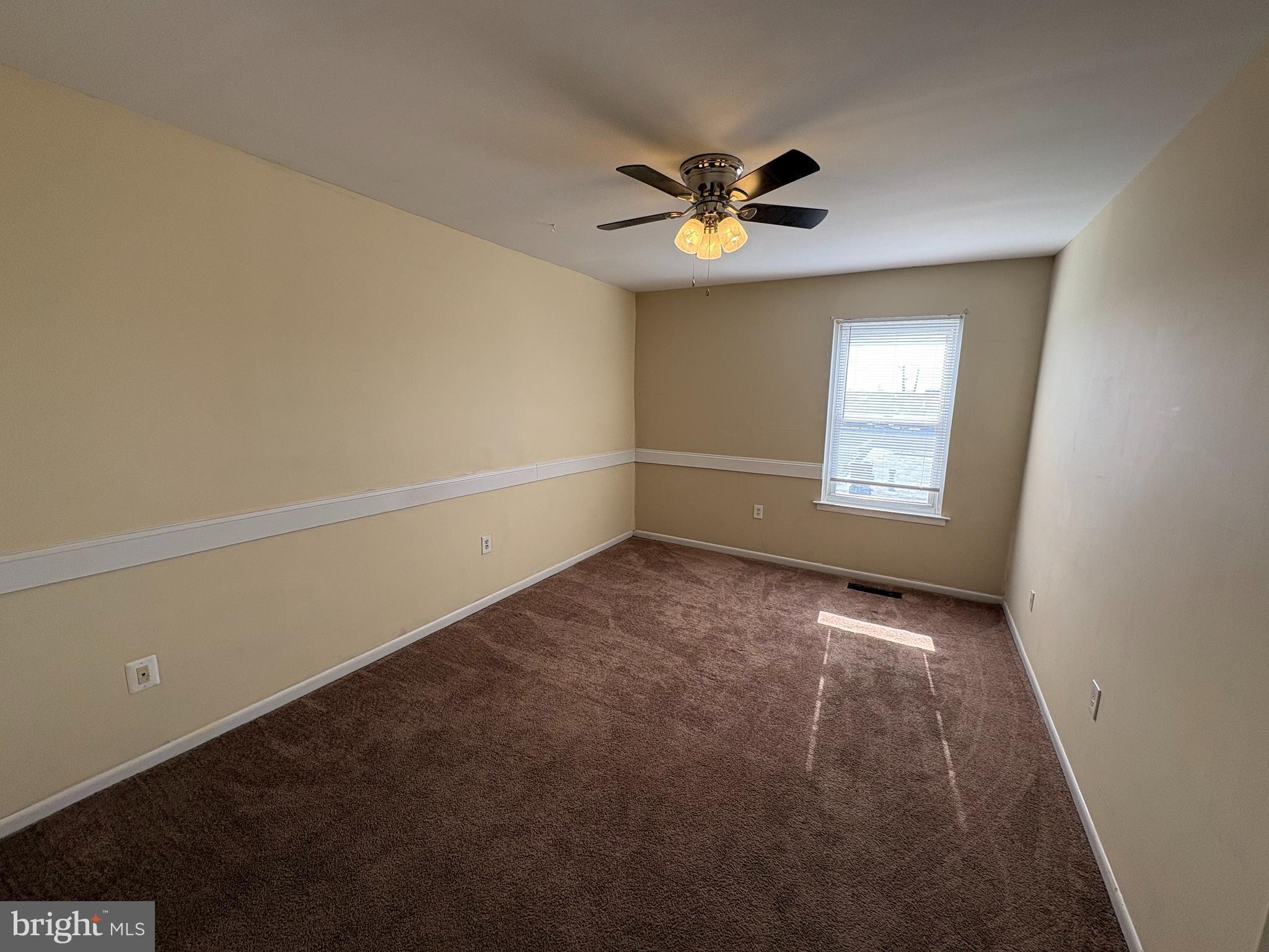 2840 Brighton Place, Unit 2 Philadelphia, PA 19149 - Photo 5 of 13 a view of empty room with window