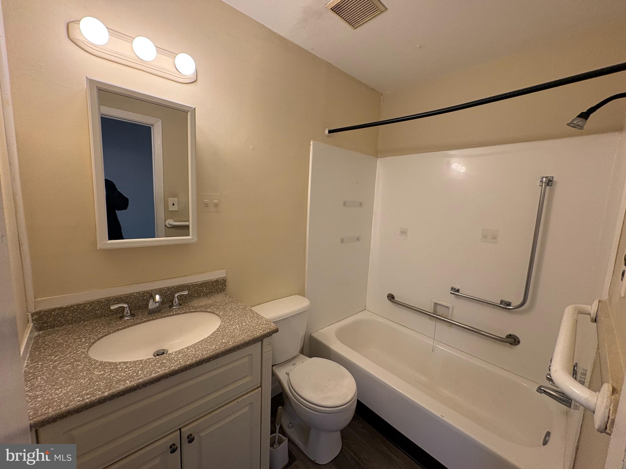 2840 Brighton Place, Unit 2 Philadelphia, PA 19149 - Photo 8 of 13 a bathroom with a granite countertop sink toilet and shower