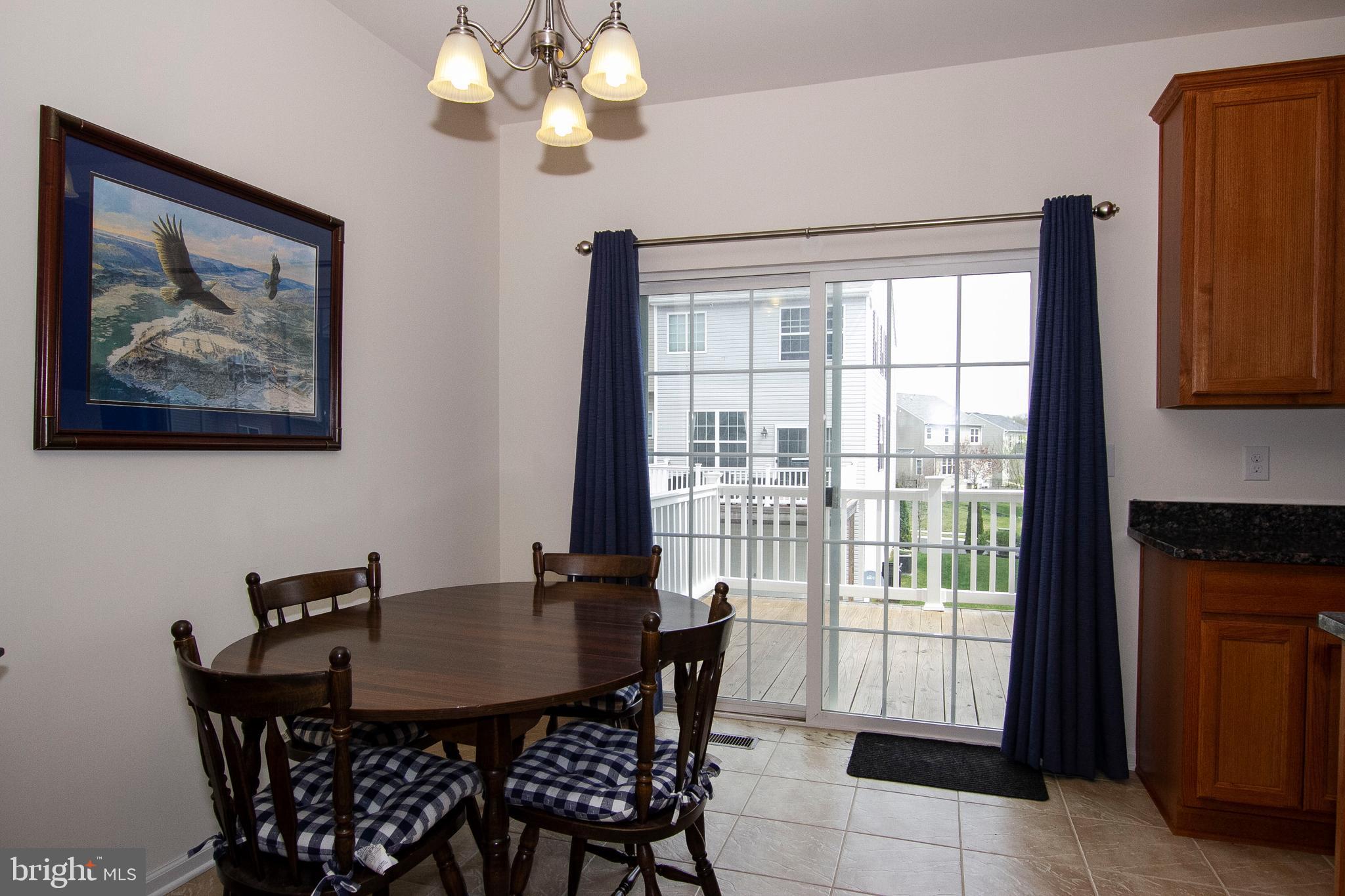 132 Augustine Road North East, MD 21901 - Photo 14 of 28 Dining area with sliders to deck