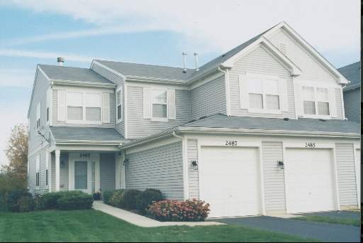 a view of outdoor space yard and front view of a house