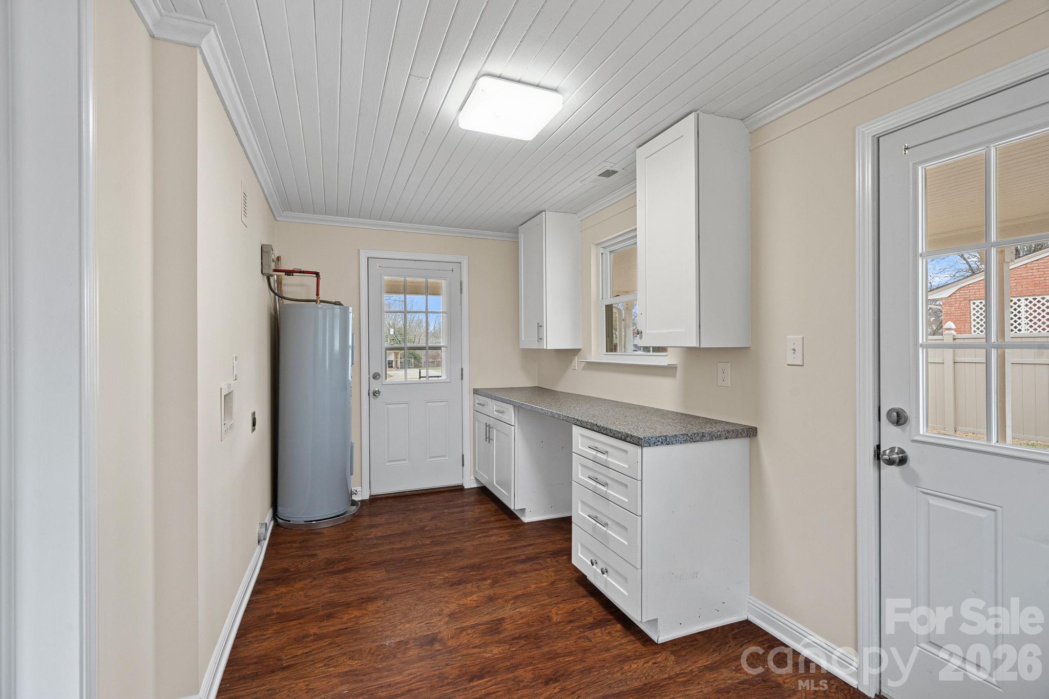 337 Fieldstone Road Mooresville, NC 28115 - Photo 16 of 25 a kitchen with granite countertop a refrigerator and a sink