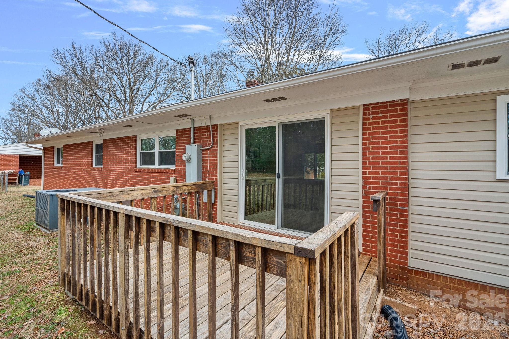 337 Fieldstone Road Mooresville, NC 28115 - Photo 22 of 25 a view of a house with a yard