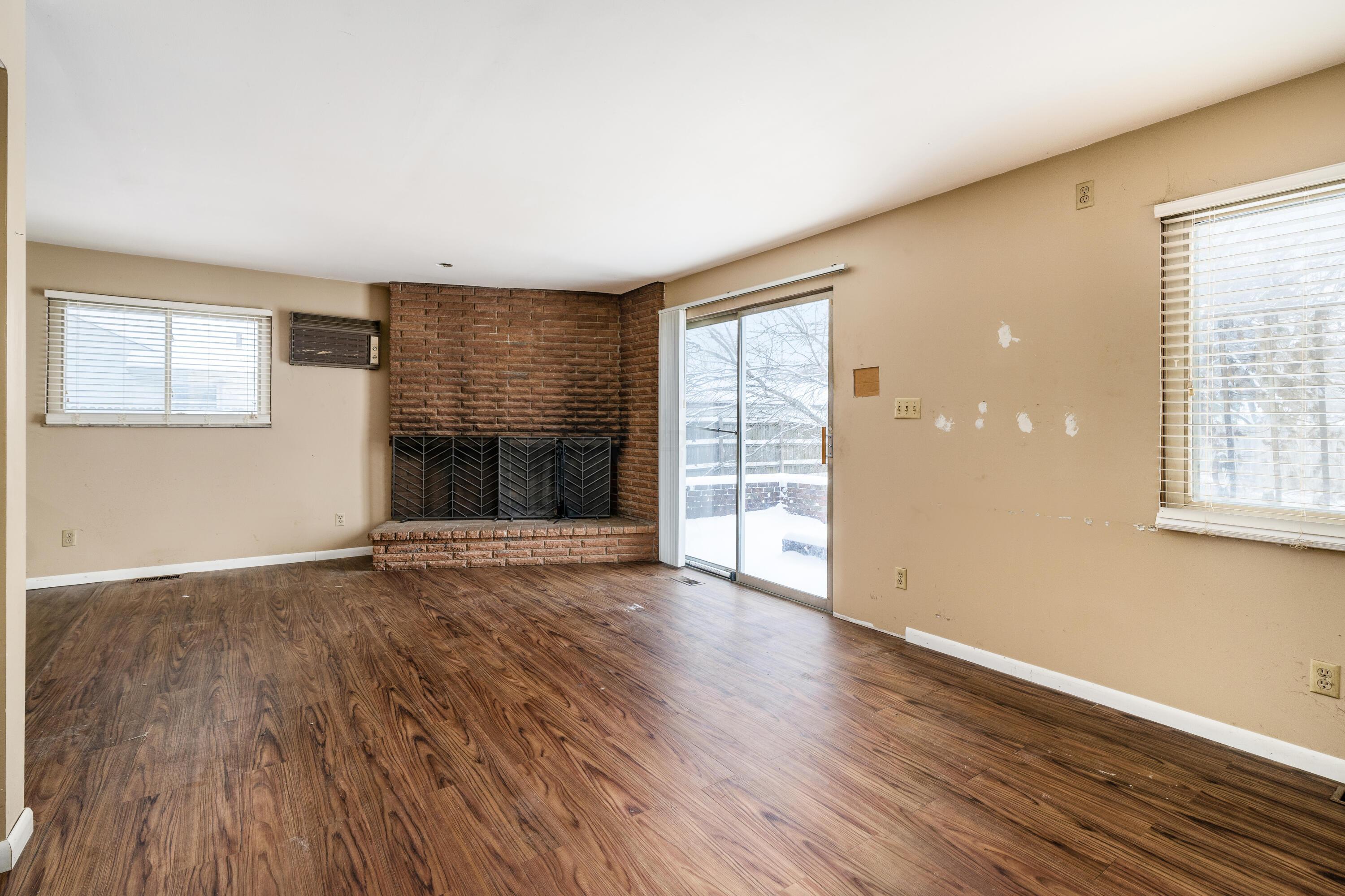 2952 Dover Road Columbus, OH 43209 - Photo 15 of 34 Fireplace in the great room. Rear patio can be accessed from the great room