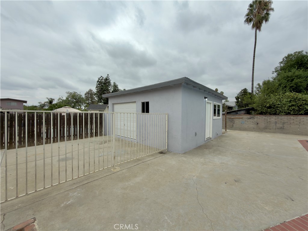332 East Rosewood Street Rialto, CA 92376 - Photo 21 of 22 a view of a house with a backyard