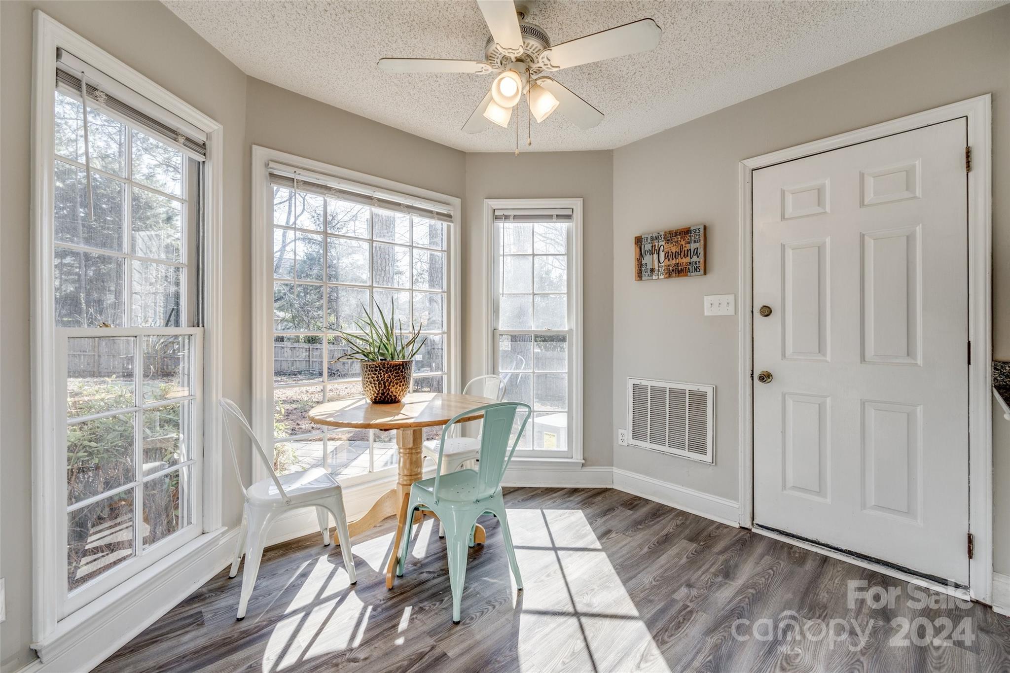 2801 Briar Ridge Drive Charlotte, NC 28270 - Photo 14 of 32 a view of a dining room with furniture window and outside view