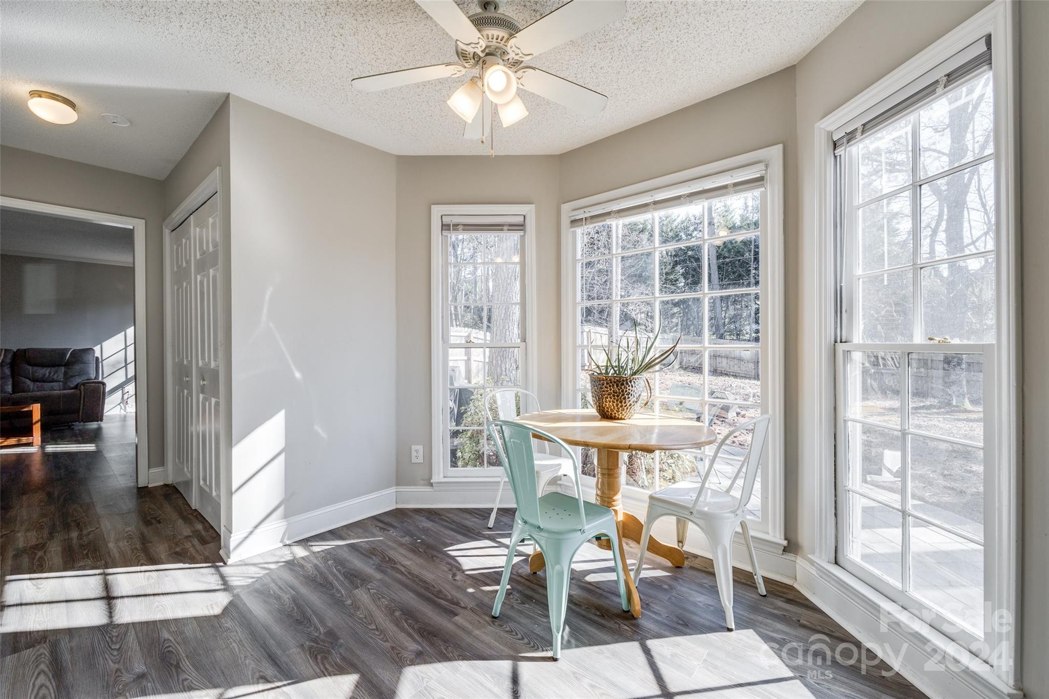 2801 Briar Ridge Drive Charlotte, NC 28270 - Photo 15 of 32 a view of a livingroom with furniture wooden floor and a chandelier