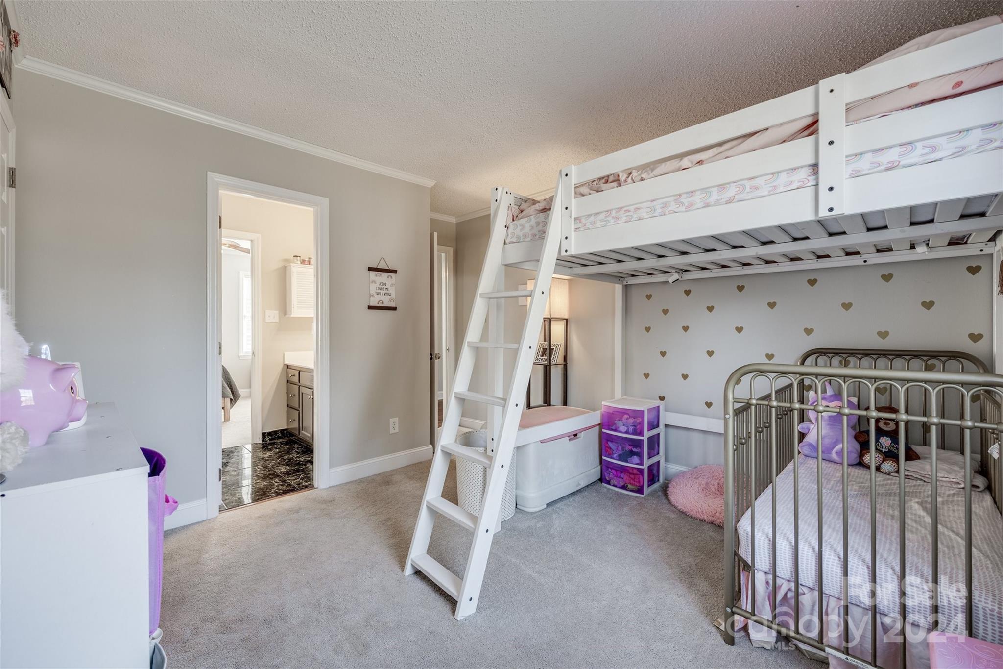 2801 Briar Ridge Drive Charlotte, NC 28270 - Photo 22 of 32 a bedroom with furniture and baby crib