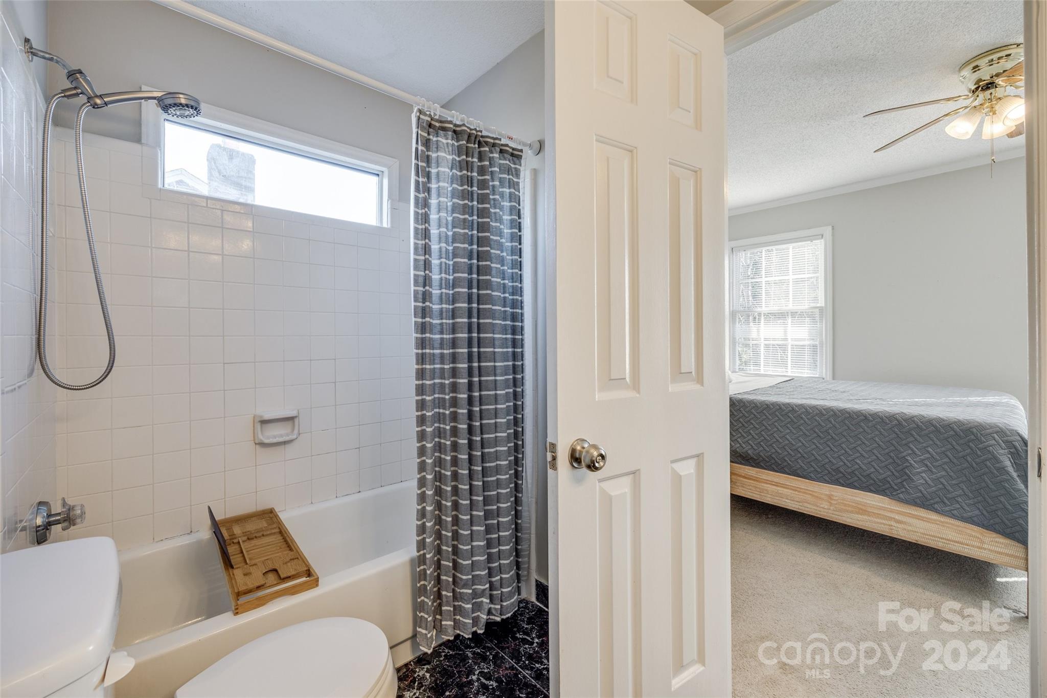 2801 Briar Ridge Drive Charlotte, NC 28270 - Photo 23 of 32 a bathroom with a tub shower sink and toilet