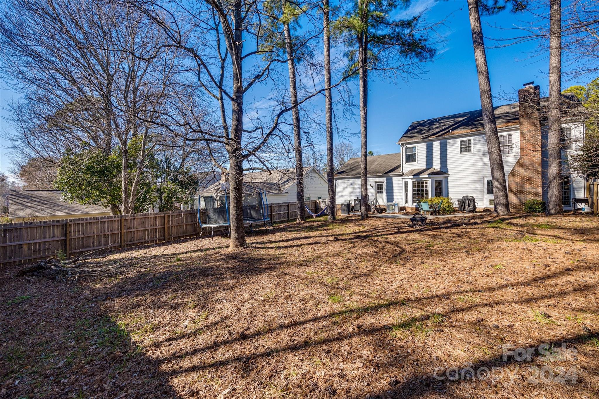 2801 Briar Ridge Drive Charlotte, NC 28270 - Photo 30 of 32 a house with trees in front of it