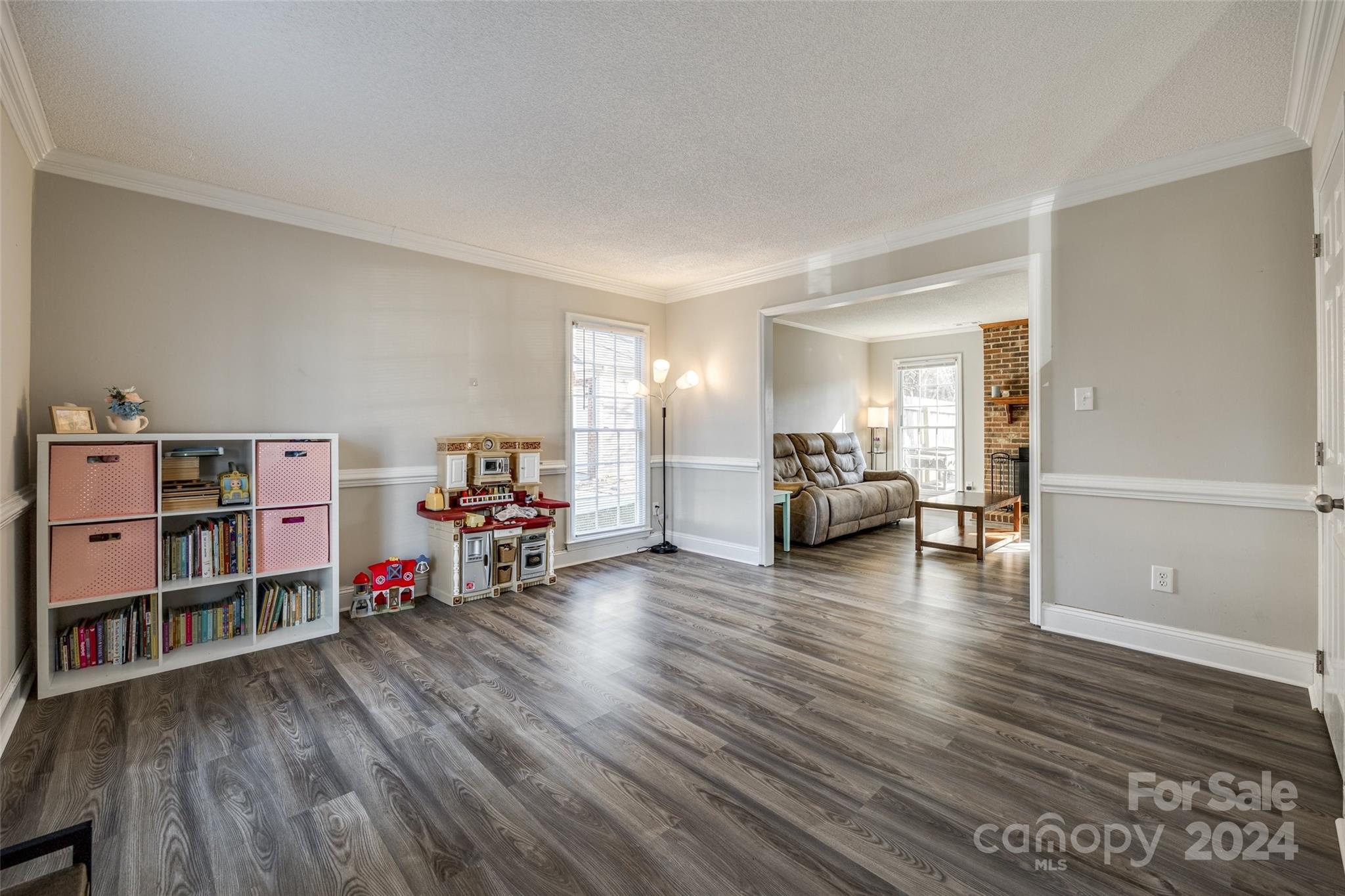 2801 Briar Ridge Drive Charlotte, NC 28270 - Photo 4 of 32 a living room with furniture and a wooden floor