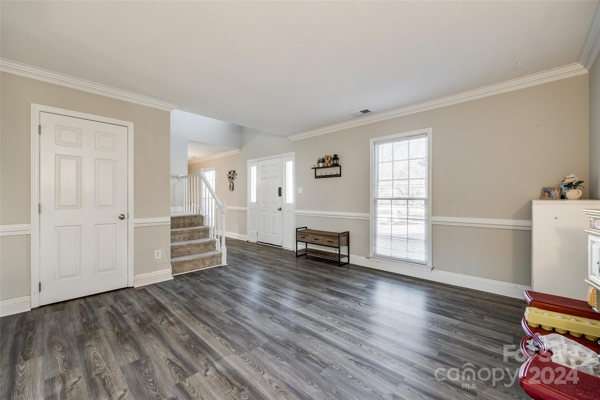 2801 Briar Ridge Drive Charlotte, NC 28270 - Photo 5 of 32 a view of livingroom with furniture and wooden floor