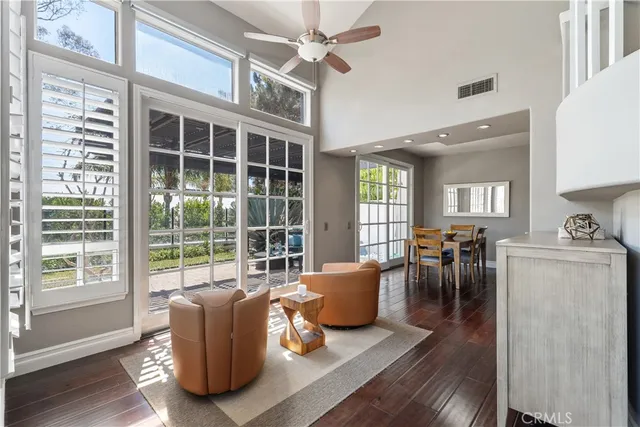 a living room with furniture and windows