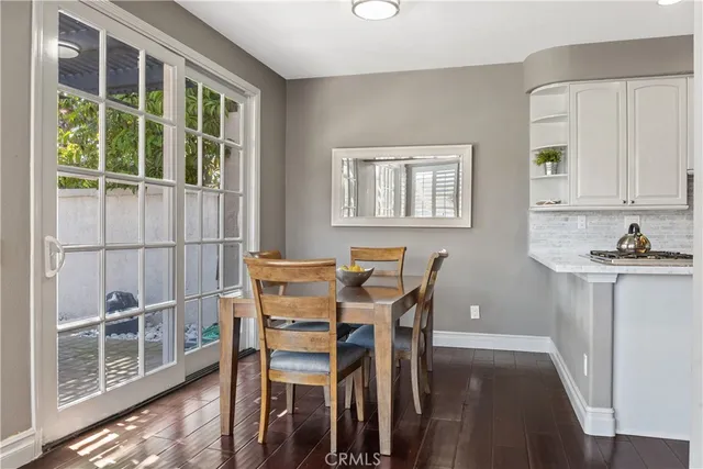 a bedroom with a bed and a chair