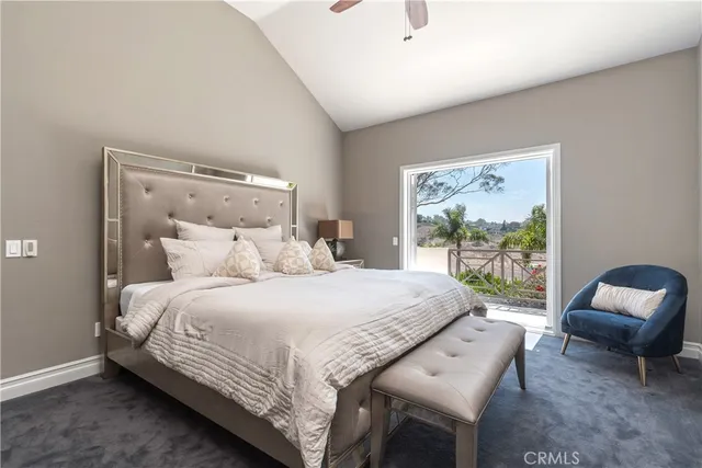 a bedroom with a bed and a table