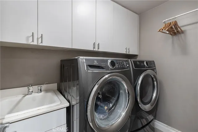 a view of a patio with couches chairs and a table and chairs