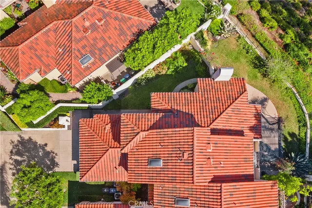 a view of a street with palm trees