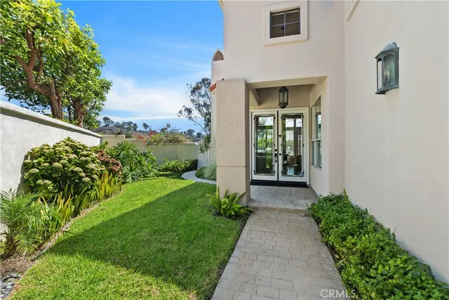 a room with wooden floor and furniture