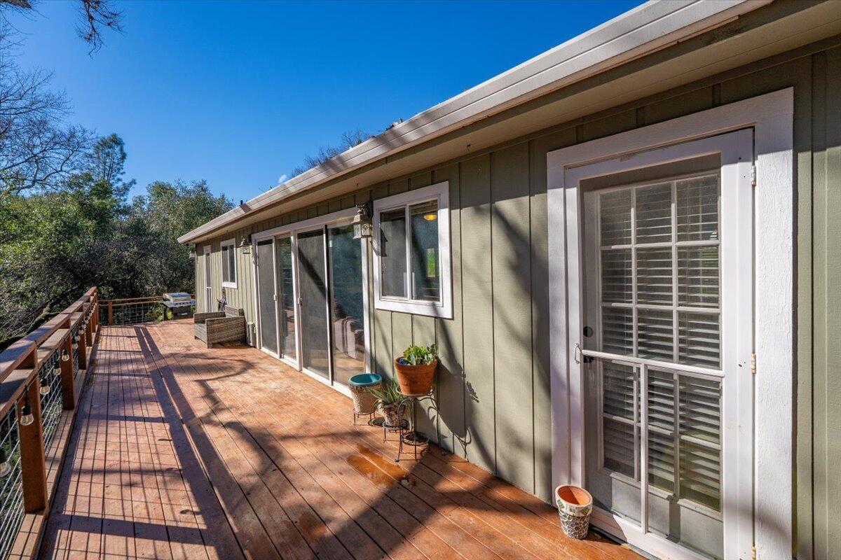 16150 Jellys Ferry Road Red Bluff, CA 96080 - Photo 2 of 37 a view of balcony with wooden floor and seating space