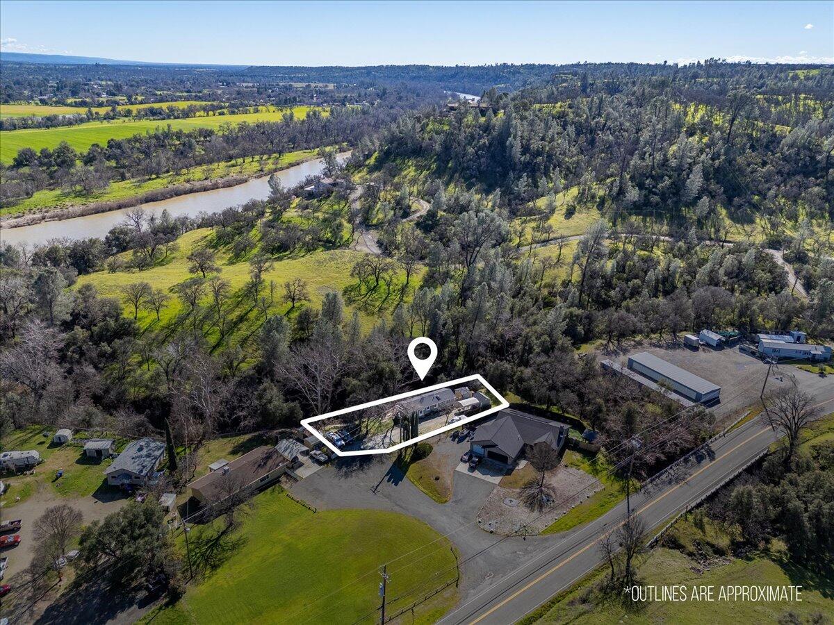 16150 Jellys Ferry Road Red Bluff, CA 96080 - Photo 24 of 37 an aerial view of a house with a yard