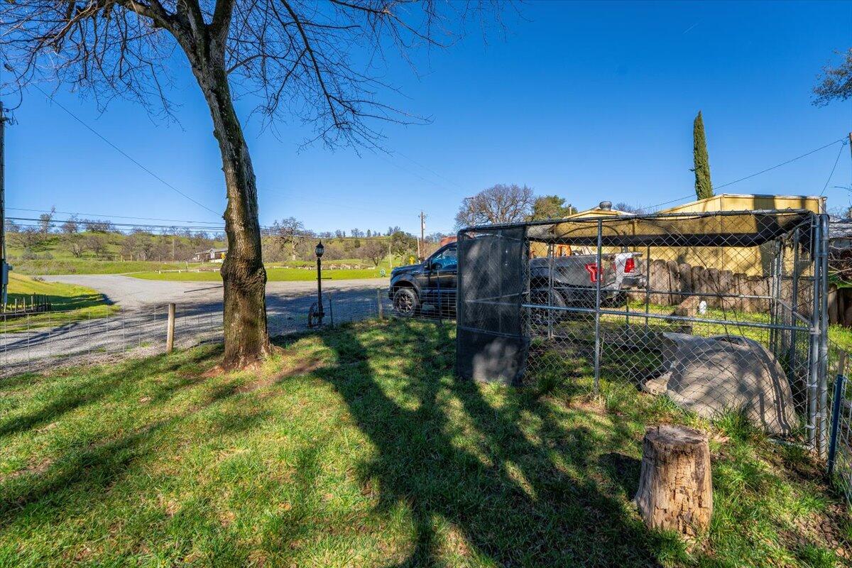 16150 Jellys Ferry Road Red Bluff, CA 96080 - Photo 28 of 37 a view of a lake with a building in the background