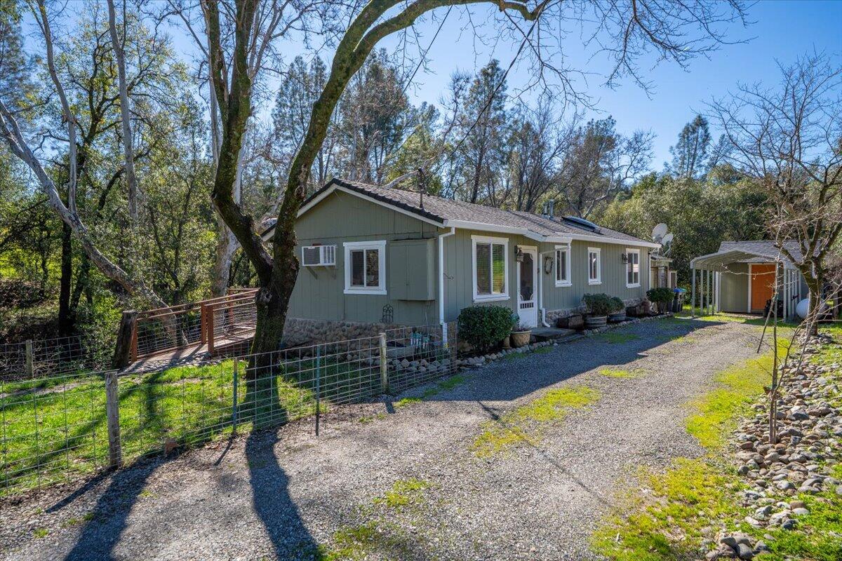 16150 Jellys Ferry Road Red Bluff, CA 96080 - Photo 30 of 37 a front view of a house with garden