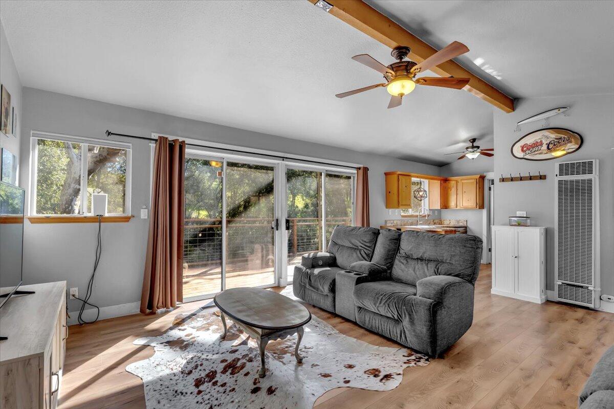 16150 Jellys Ferry Road Red Bluff, CA 96080 - Photo 3 of 37 a living room with furniture and a large window