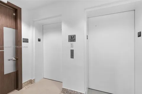 a view of a hallway with elevator