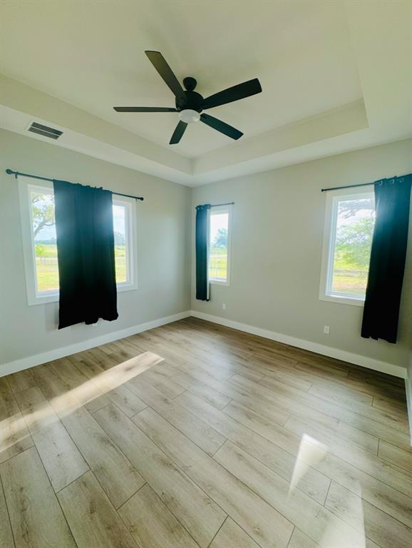 642 Fm 1995 Van, TX 75790 - Photo 17 of 28 a view of a livingroom with a ceiling fan and window