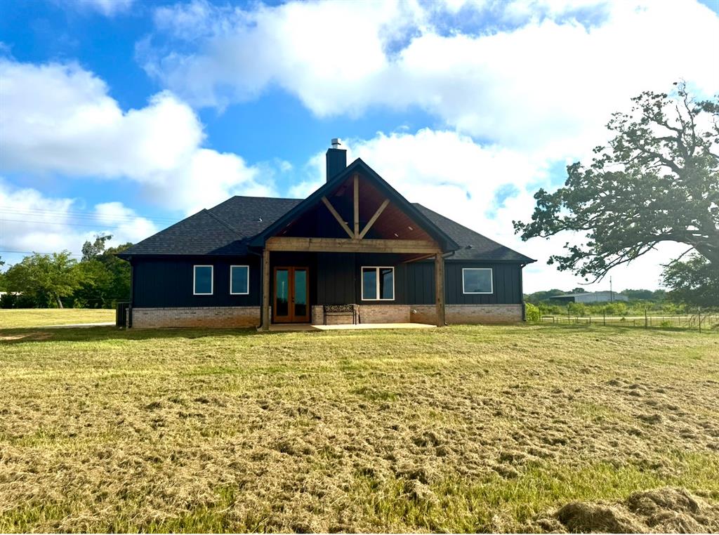642 Fm 1995 Van, TX 75790 - Photo 3 of 28 a front view of a house with a yard