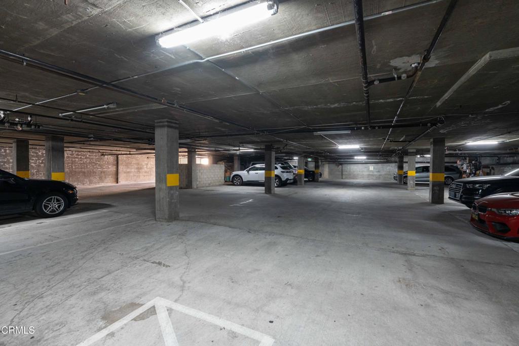 907 West Mission Road, Unit B Alhambra, CA 91801 - Photo 26 of 27 a view of parking garage with cars
