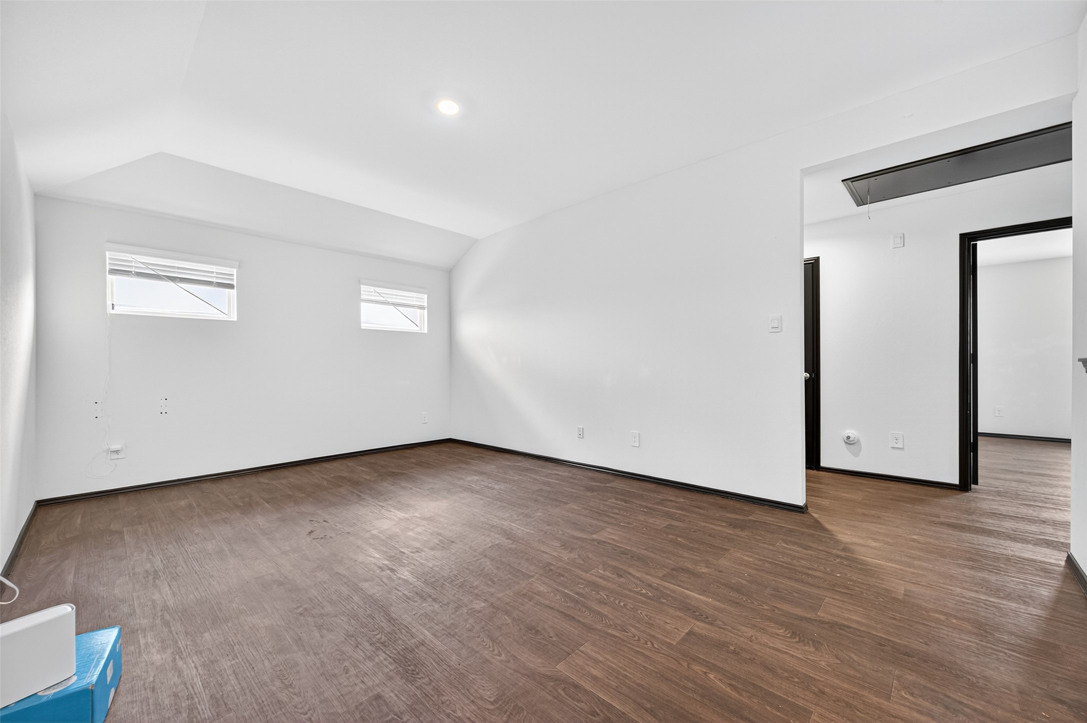 21538 Violet Rdg Road Katy, TX 77449 - Photo 26 of 39 a view of an empty room with wooden floor and a window