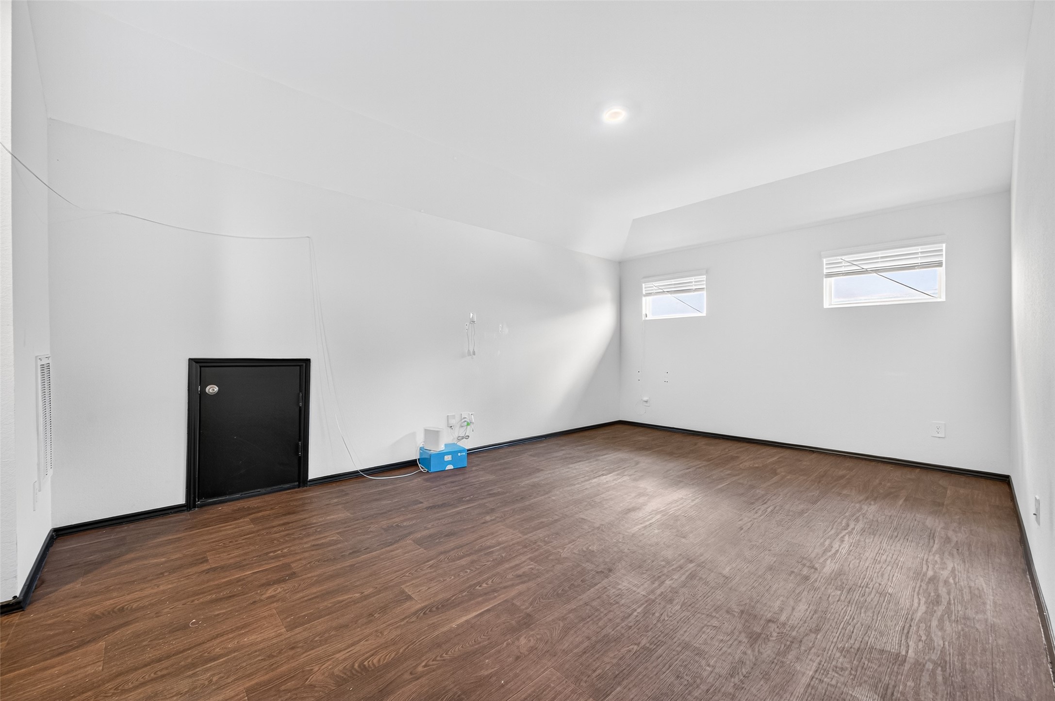 21538 Violet Rdg Road Katy, TX 77449 - Photo 27 of 39 a view of an empty room with wooden floor